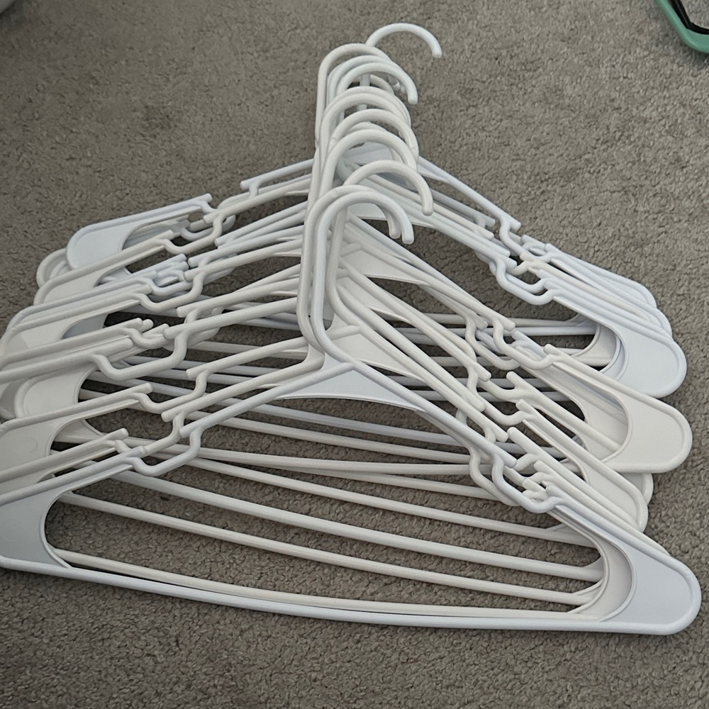 Set of White Plastic Hangers